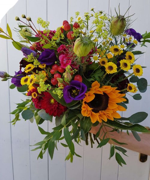 bouquet yellow red purple sunflowers scaled