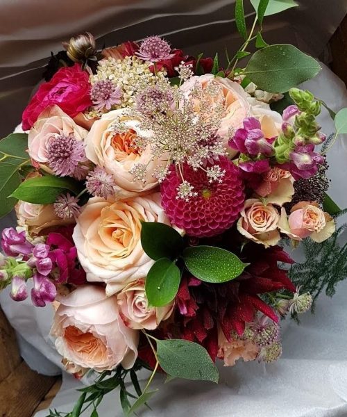 classic bridal bouquet garden roses peach burgundy Larkspur Floral Design Cambridge Uk