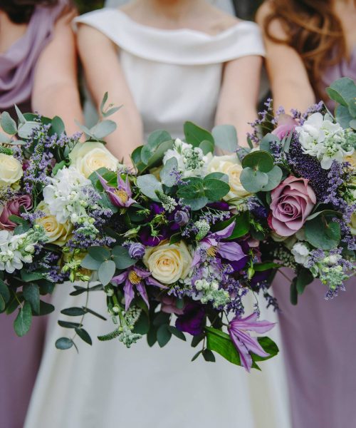 purple lilac bridesmaids bouquets